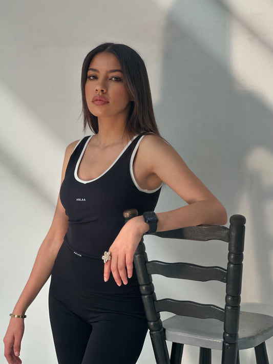 TOP GAINANT DE SPORT NOIR ET BLANC Ablaa maintien élevé, couvrante et confortable
