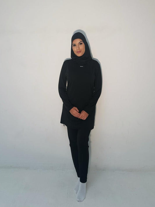 Pour les femmes voilées en quête de modestie, de confort et de praticité, cet ensemble sportswear avec hijab intégré 