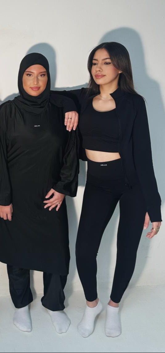 Veste de Sport Noire Femme – Coupe Slim & Respirante