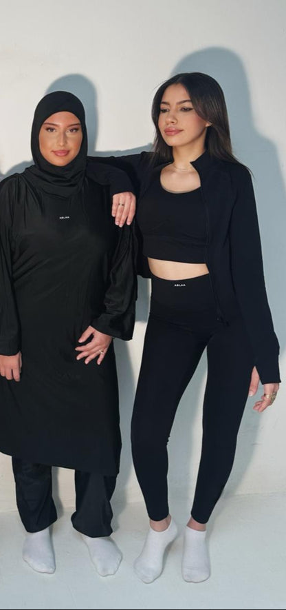 Veste de Sport Noire Femme – Coupe Slim & Respirante